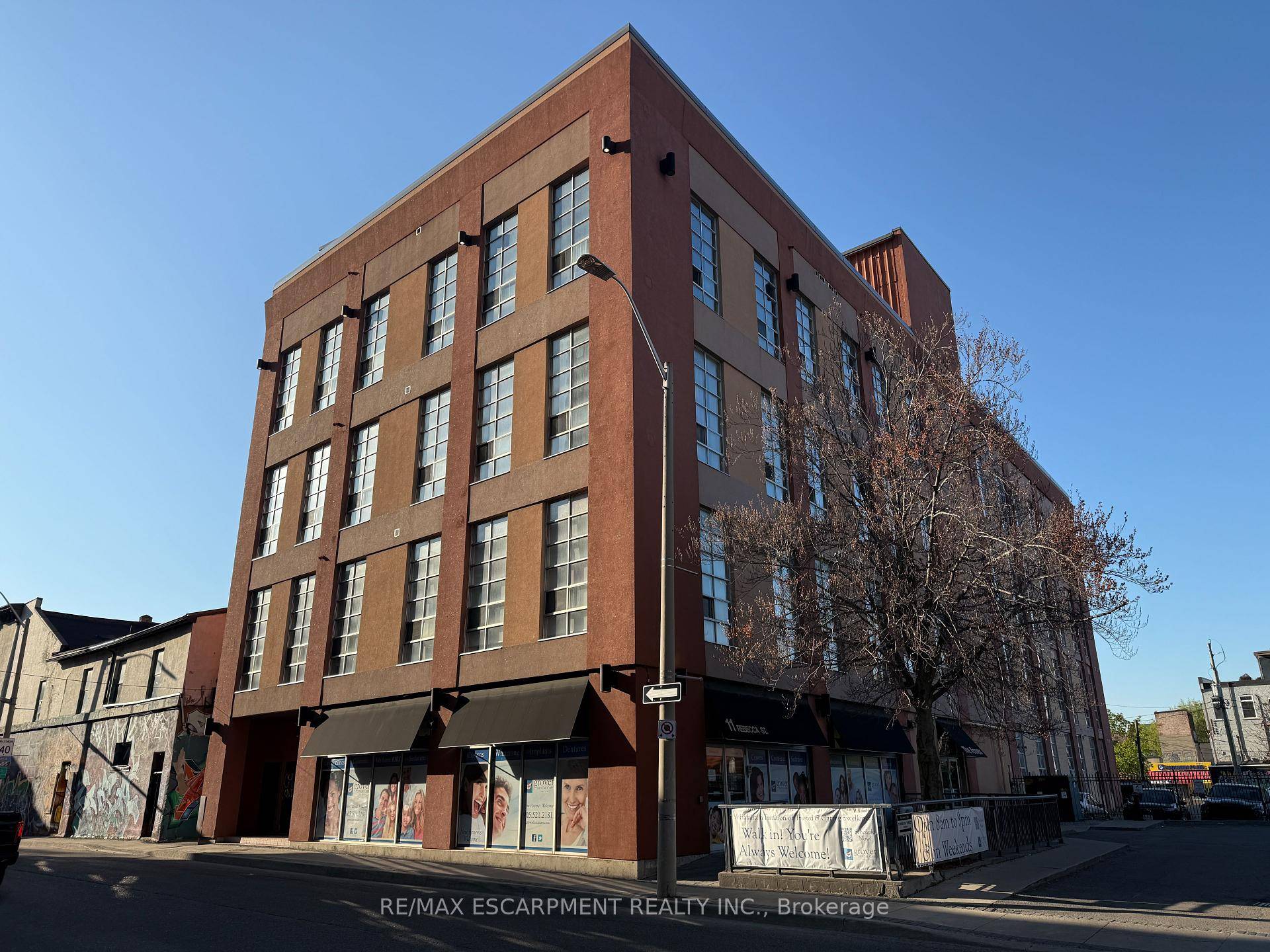 Welcome to Unit 406 at The Annex, an Impressive 2 Bedroom, 1 Bathroom Industrial Loft and Considered One of Hamilton's Most Desirable Boutique Condo Buildings.