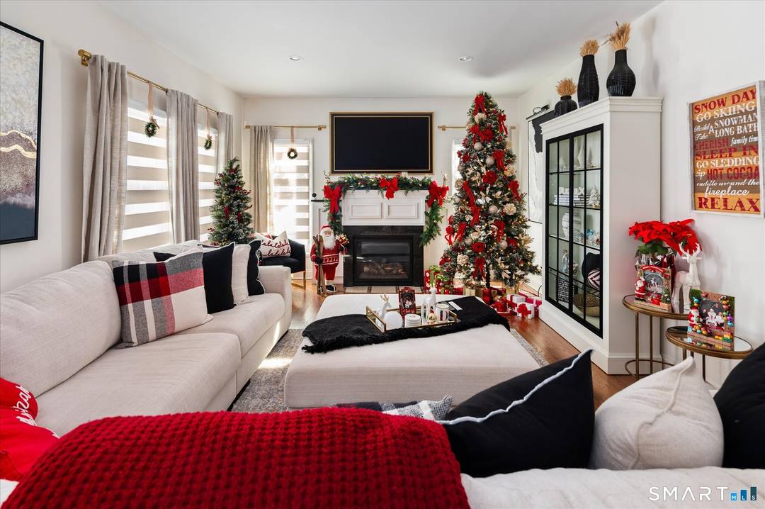 Custom built Colonial with nine foot ceilings on the first level and many custom features.