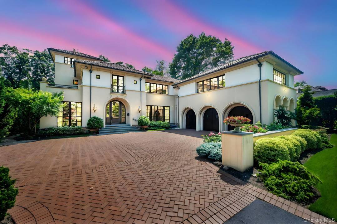 Welcome to an exquisite custom built masterpiece nestled at 48 Nassau Drive in the prestigious Village of Kensington in Great Neck, NY.