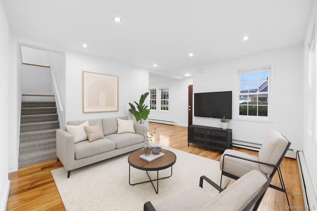 Sitting on a 40x100 corner lot in prime Cambria Heights, this fully remodeled all brick 4 bedroom, 3 bathroom cape delivers the rare combination of generous interior space and a ...