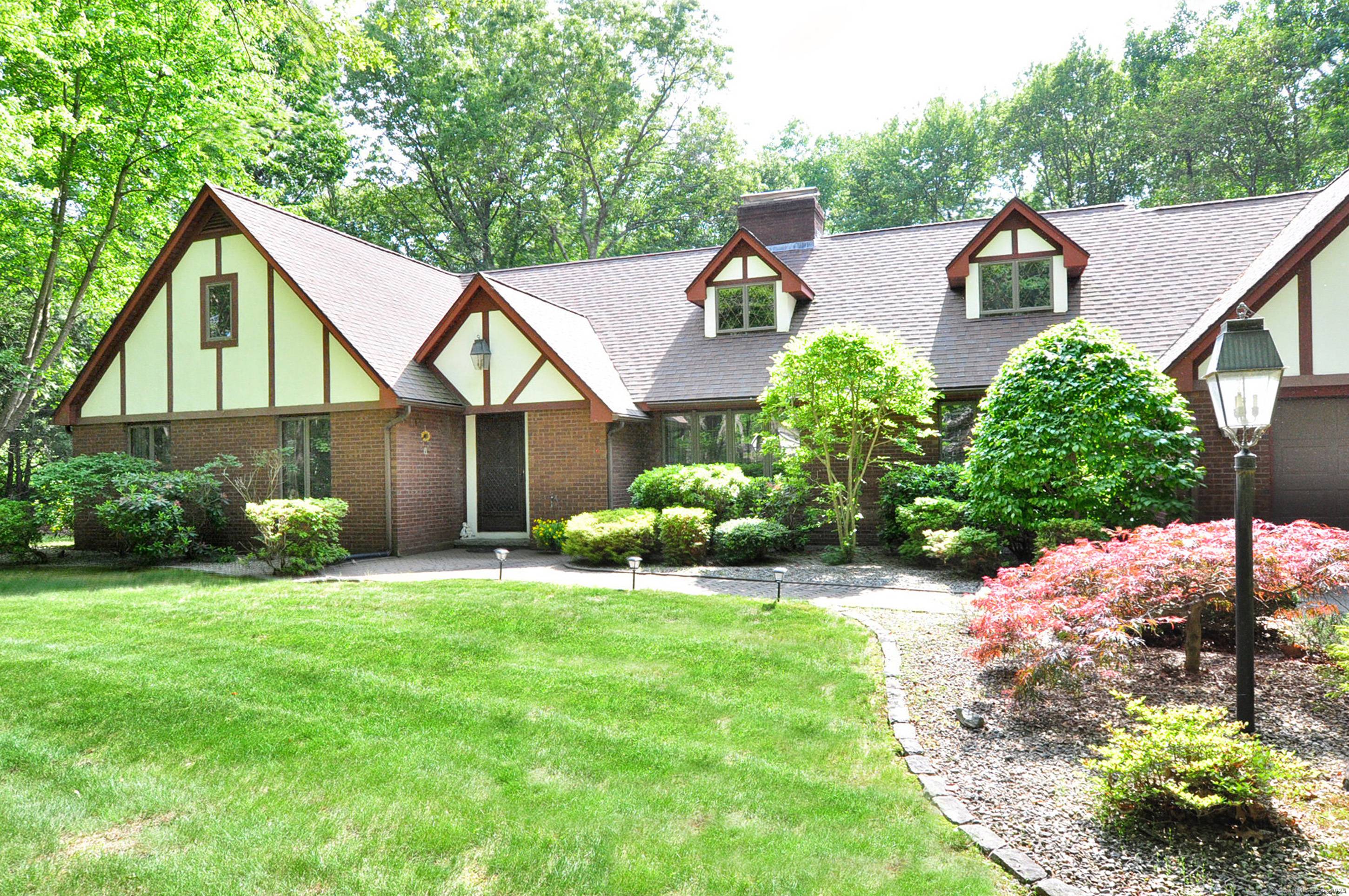 Welcome home to this Tudor Ranch style home with 4 bedrooms, 2.