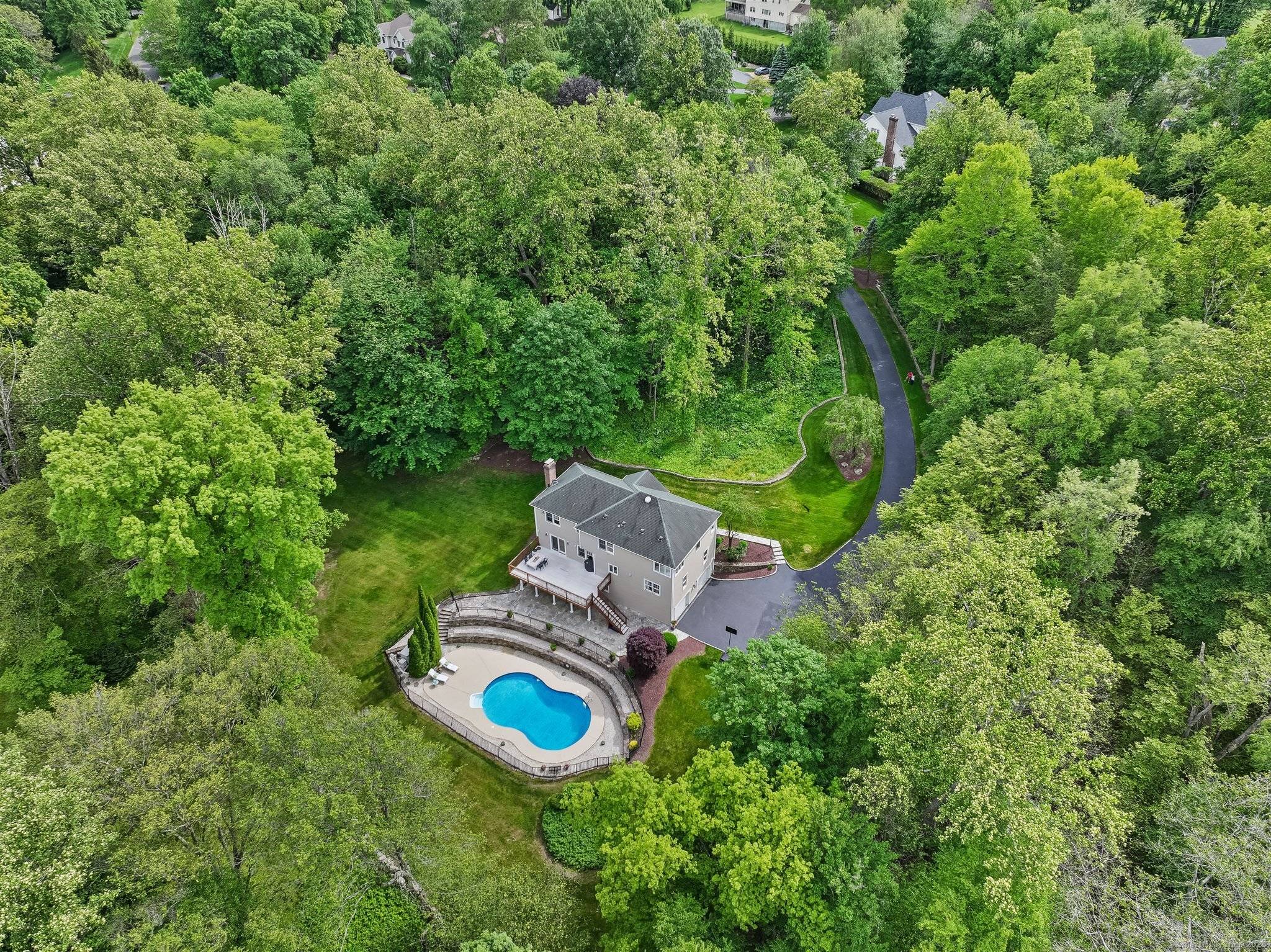 Barely over Fairfield's border, this lower Easton oasis offers a rare combo of secluded privacy and unbeatable convenience of nearby amenities and Metro North.