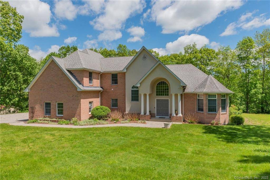 Stunning brick contemporary home with seasonal views of Colchester.