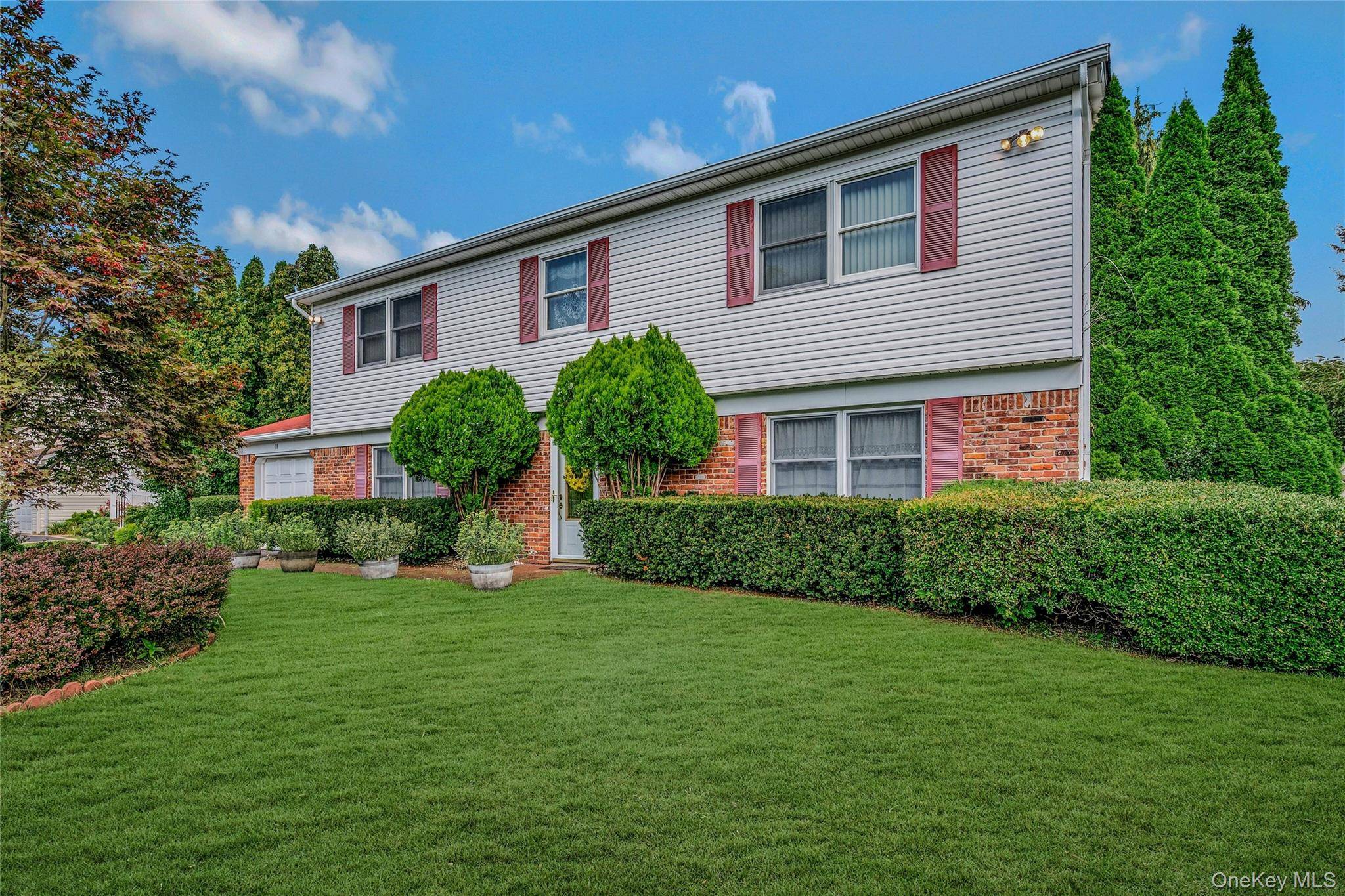 Welcome to this Immaculate Home in South Setauket Park.