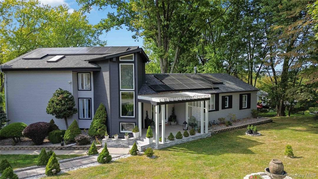 Tucked away in a peaceful, tree lined neighborhood, 46 Woodland Rd offers the perfect balance of tranquil suburban living and modern comfort.