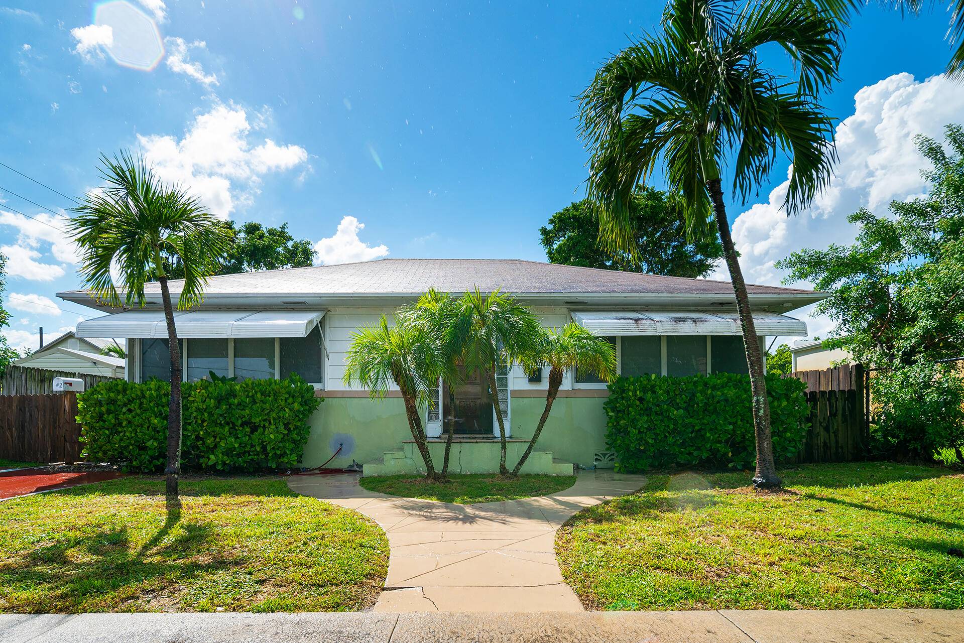 Discover a versatile income producing investment in the heart of Lake Worth Beach !