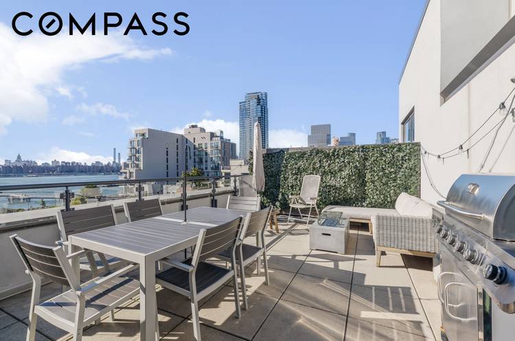 This luxurious two bedroom, two bathroom penthouse offers an expansive terrace with sweeping views of the East River and the Manhattan skyline.