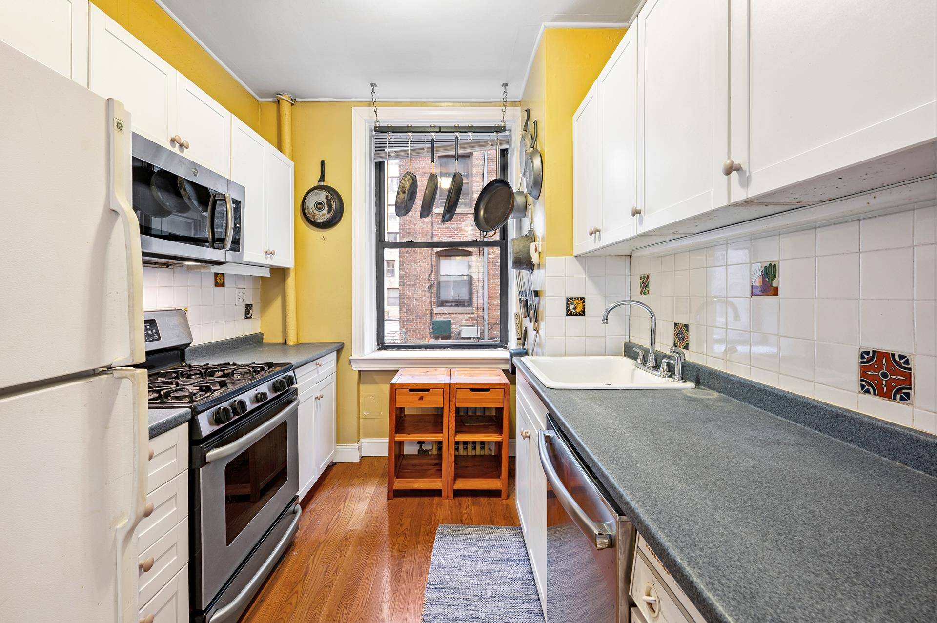 Experience the flexibility and character of this four room corner co op, perfectly situated between Broadway and Riverside Drive in the heart of vibrant Morningside Heights.