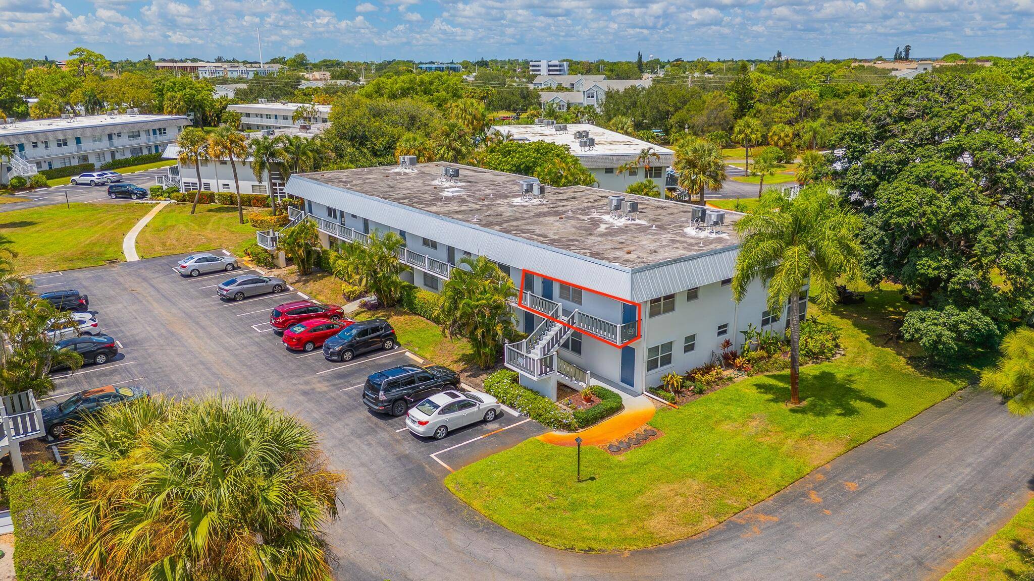 Enjoy the Florida Breezes on the Charming porch in this Light and Bright 2 Bed, 2 Bath Immaculate Updated 2nd Floor Corner Unit in Sought After Village 8 of Cedar ...