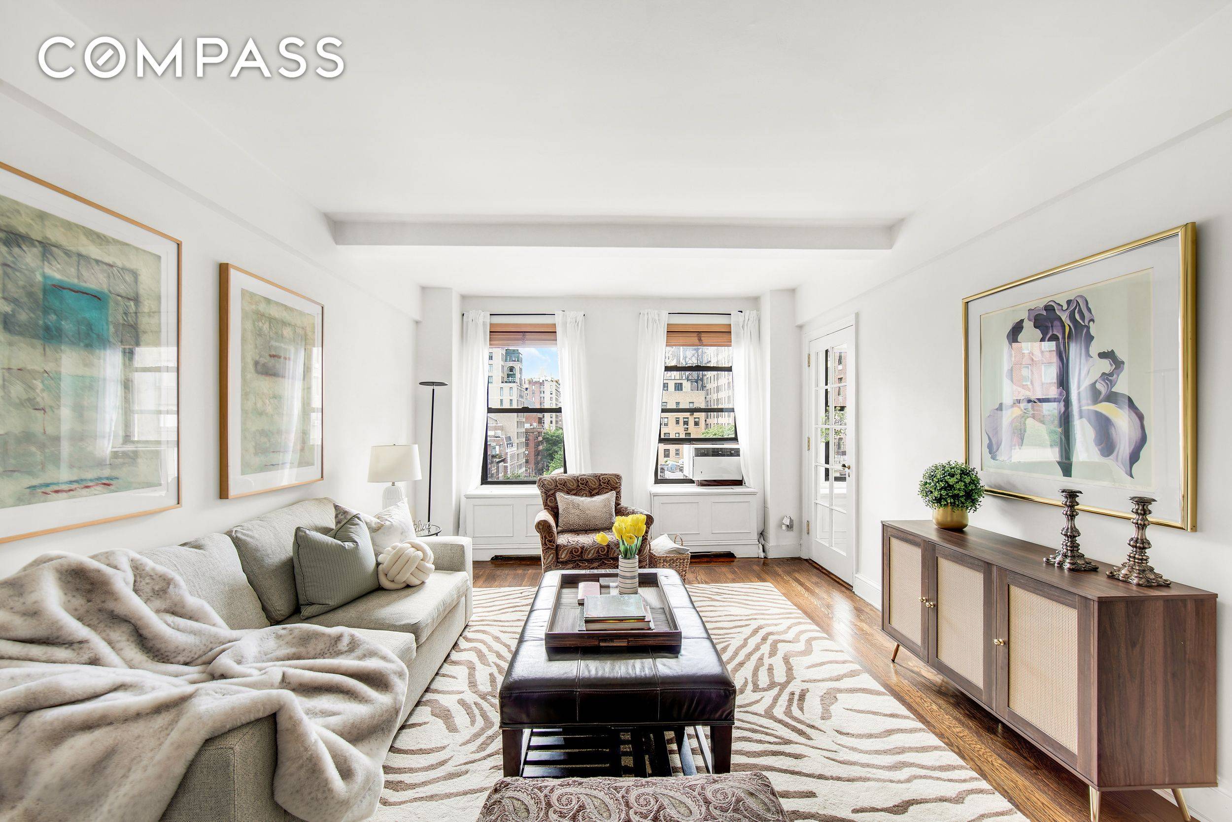 Elegant Corner Turn Key One Bedroom with Timeless Charm and Tons of Natural Light !