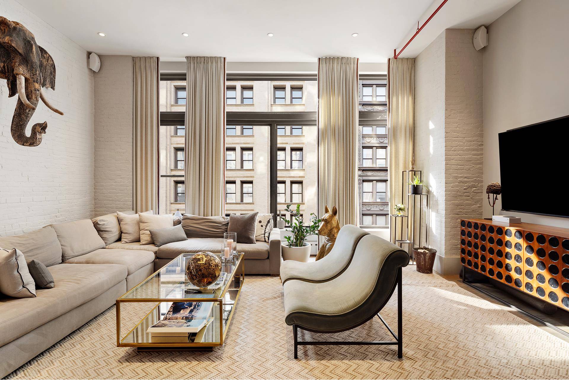 A Masterfully Reimagined Loft in the Heart of NoHo Tucked away in one of downtown Manhattan's most coveted enclaves, this bespoke loft is a rare offering that blends soaring pre ...