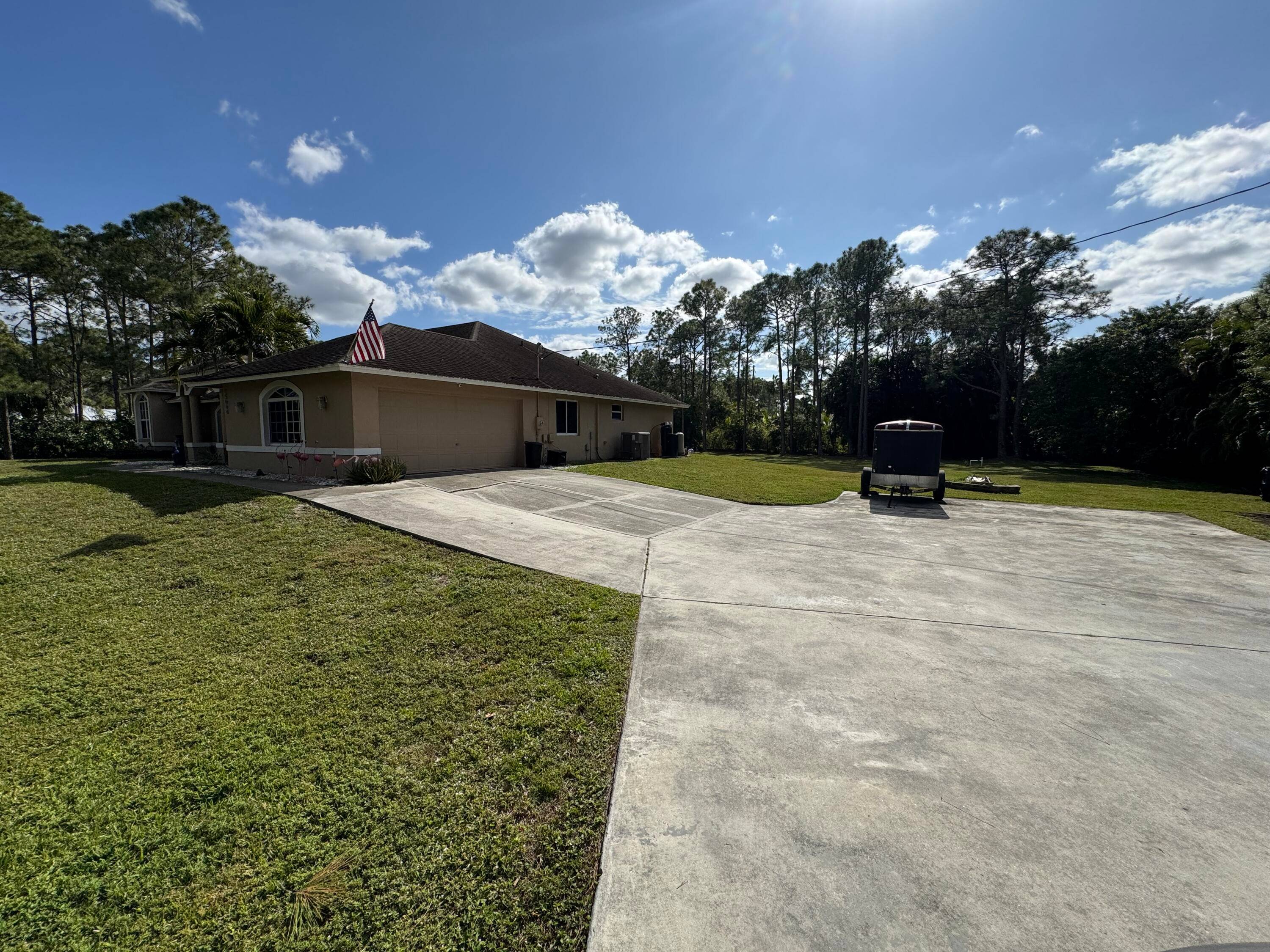 Gorgeous custom residents on over an acre of land with a private pool.