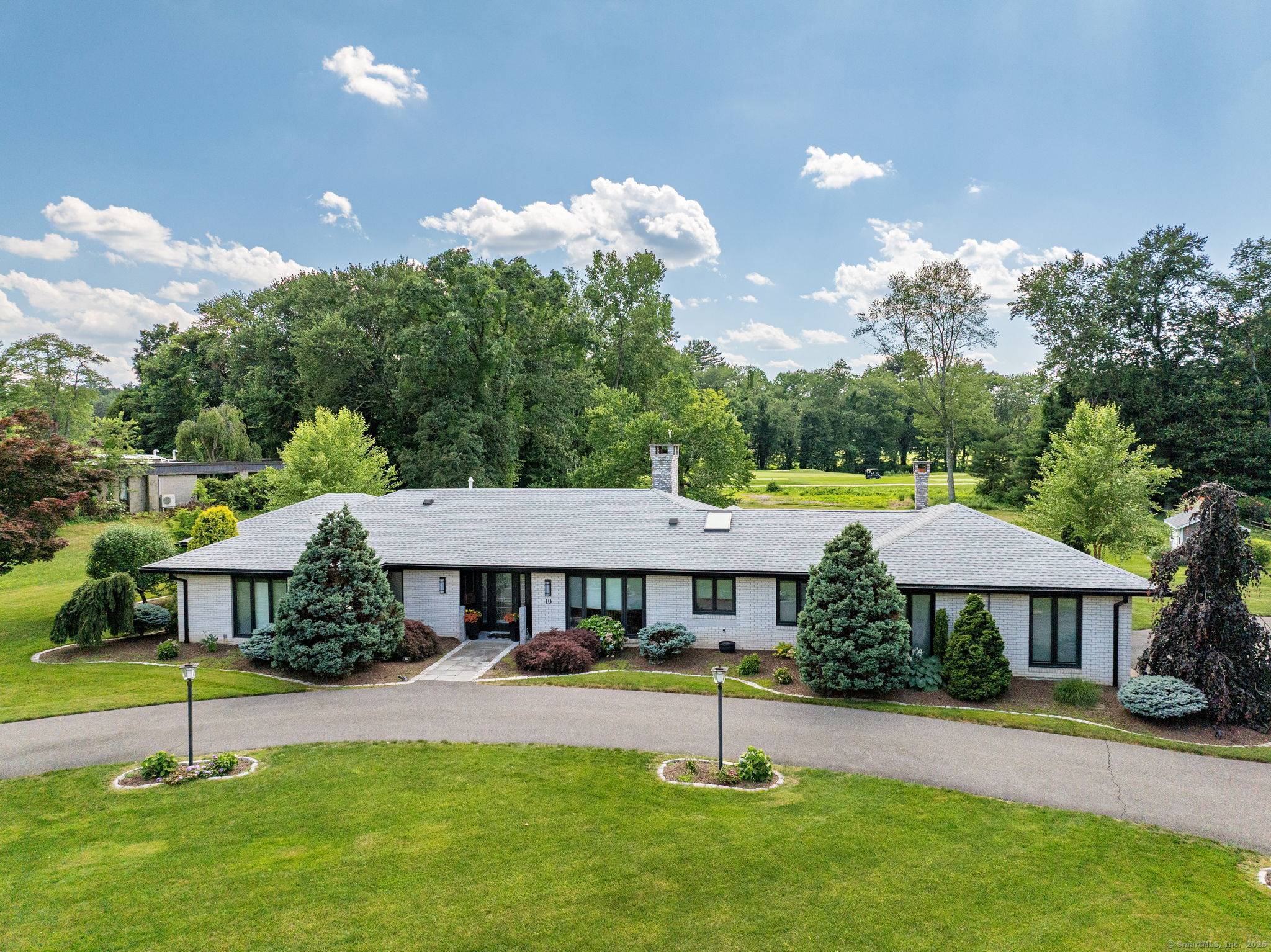 The gorgeous, golf course location is the icing on the cake of this clean, bright and modern ranch.