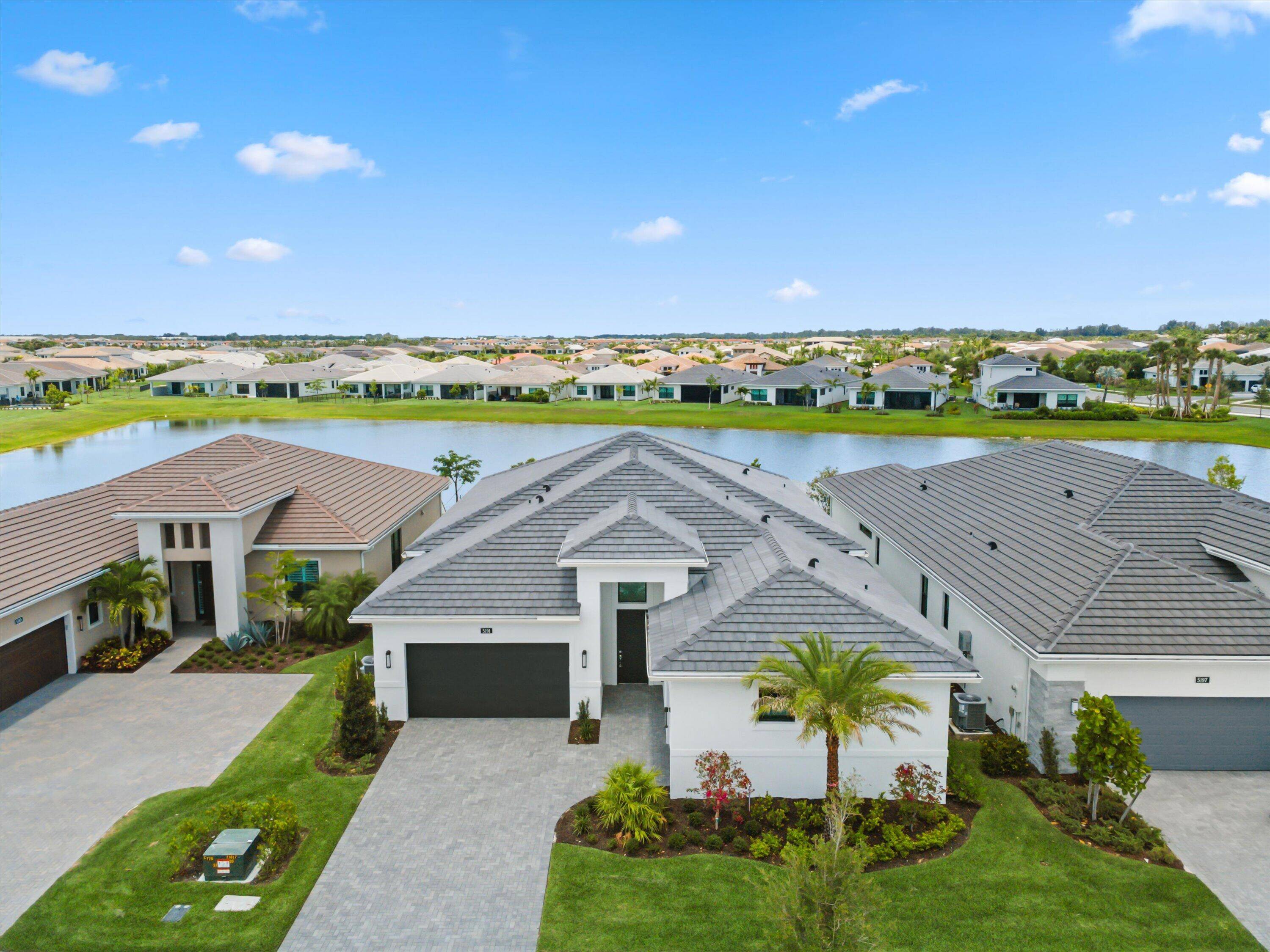 Welcome to the Sydney model in the premier 55 Cresswind community of Westlake, FL a brand new, single story residence offering 2, 776 square feet of refined living space, complete ...