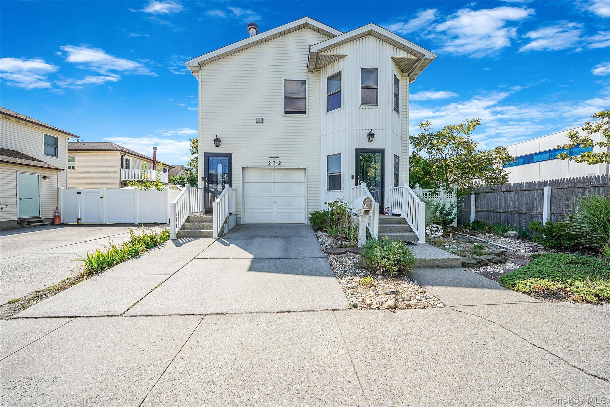 Welcome to 272 E Harrison Street, a well maintained two family home built in 1999, offering flexibility for homeowners and investors alike.