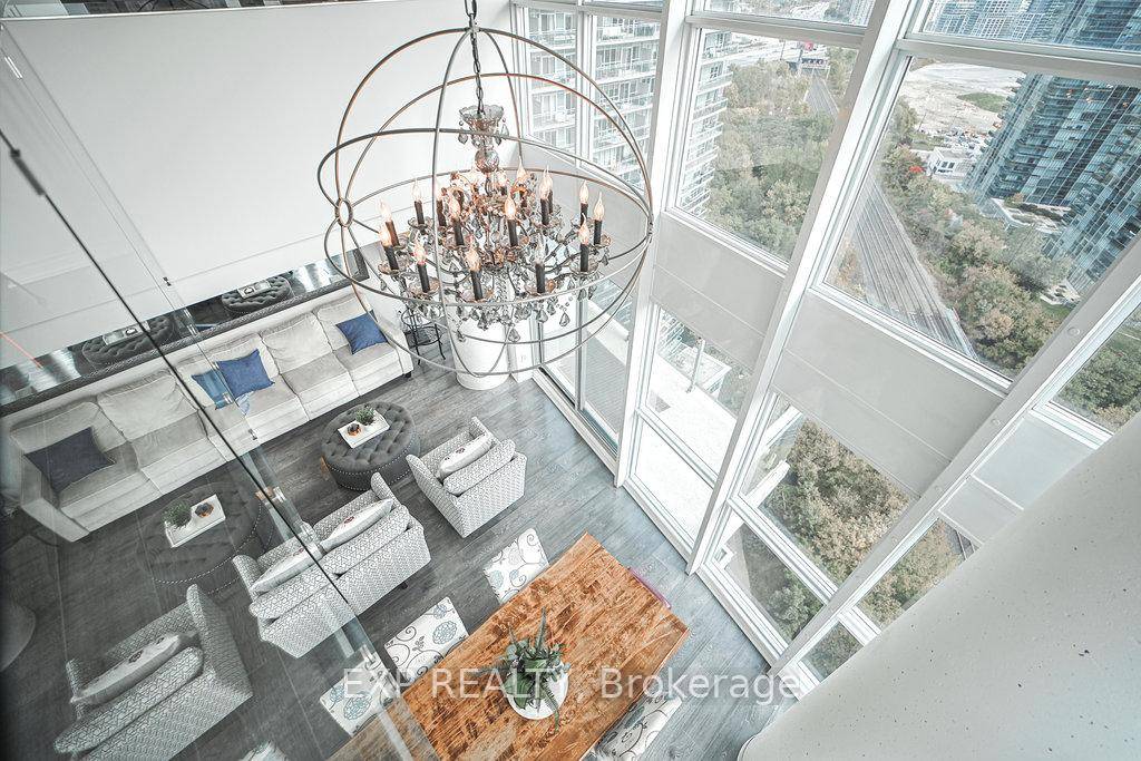 Spacious Two Storey Loft Living With Breathtaking Views Of Lake Ontario And The City Skyline.