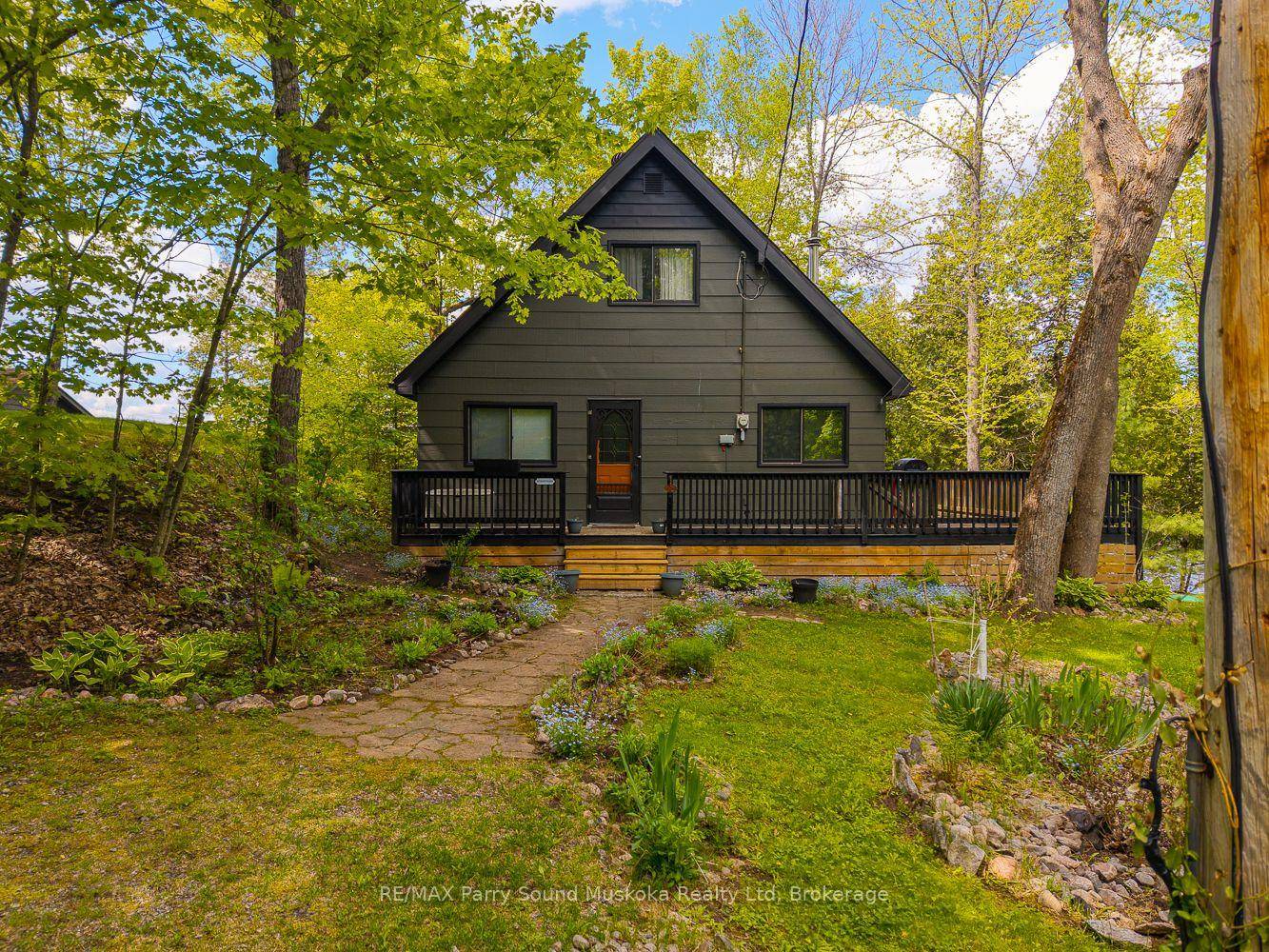 4 season three bedroom and one bathroom on a year round road situated on a gorgeous point of land.