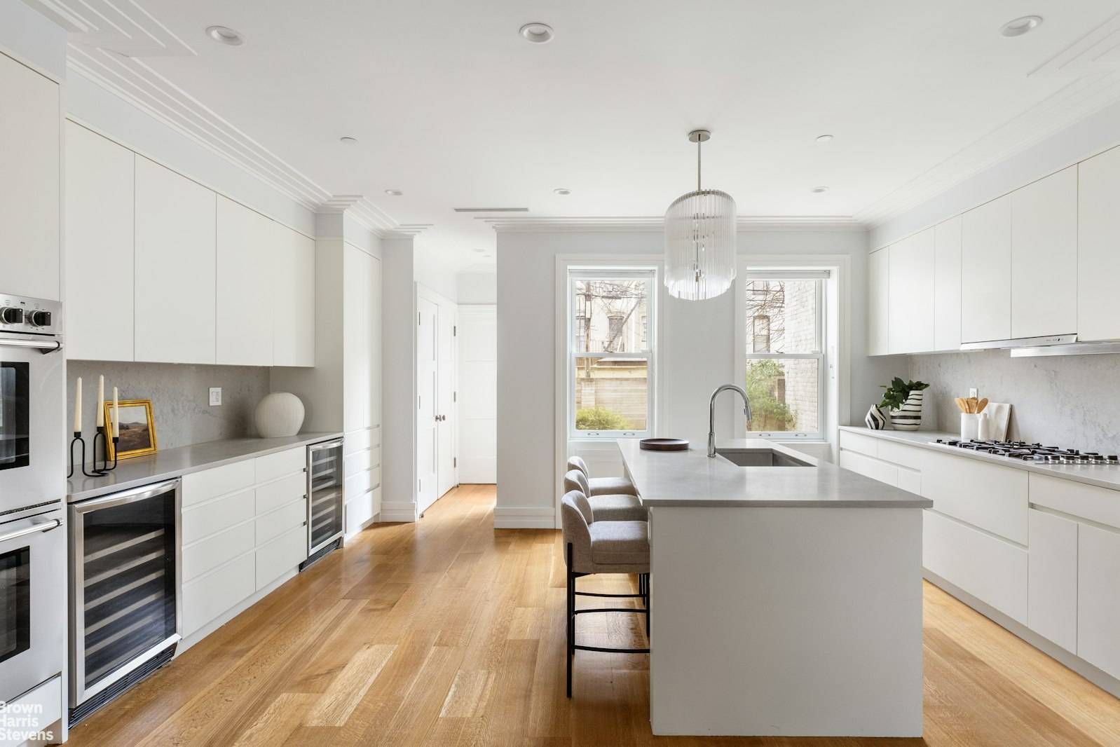 Nestled on a picturesque, tree lined block in Brooklyn, this meticulously designed residence combines timeless elegance with modern sophistication.