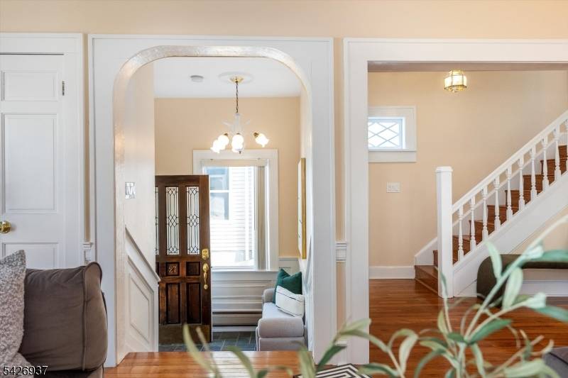 On a tree lined street, just minutes from the Glen Ridge train station, sits this lovely four bedroom home with one full bath and two half baths.