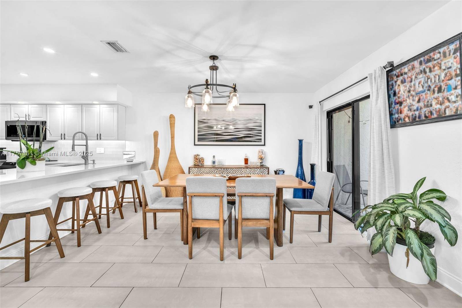 Beautifully updated townhome in Ironwedge with a private tropical garden view.