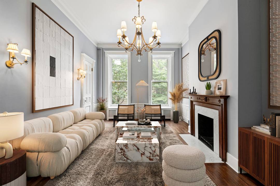 A renovated two family townhouse nestled less than two blocks from Central Park, this 7 bedroom, 3.