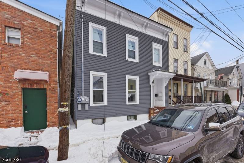 Beautifully renovated home located at 206 Clark Pl, Elizabeth, NJ featuring 4 spacious bedrooms and large bathrooms, thoughtfully updated for modern living.