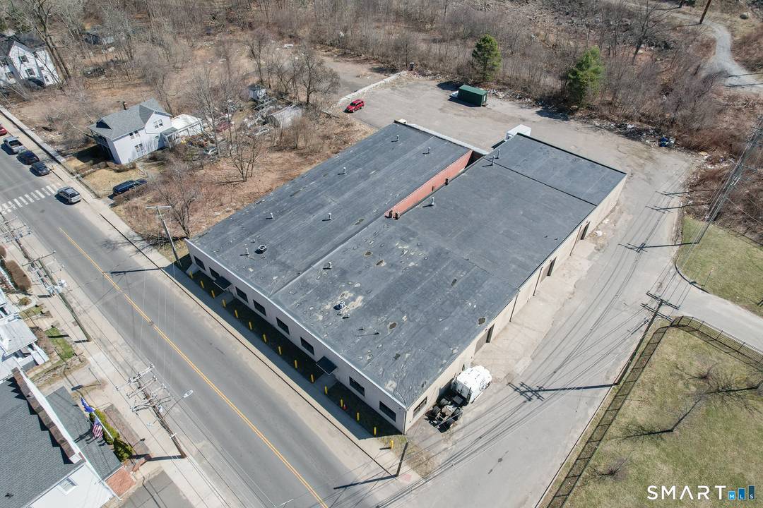 Exponential Potential Abounds with this 5 Parcel Under developed, RM Zoned Moderate Density Multi Residence parcel currently being utilized as light industrial on only a fraction of the parcel.