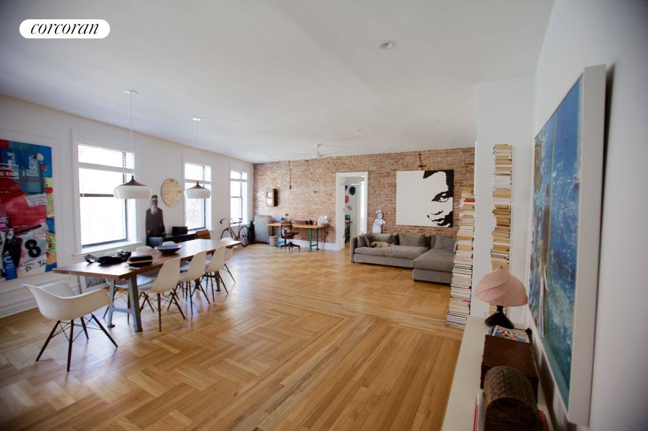 Move right into this wonderful loft like, corner, convertible three bedroom apartment with lots of light.