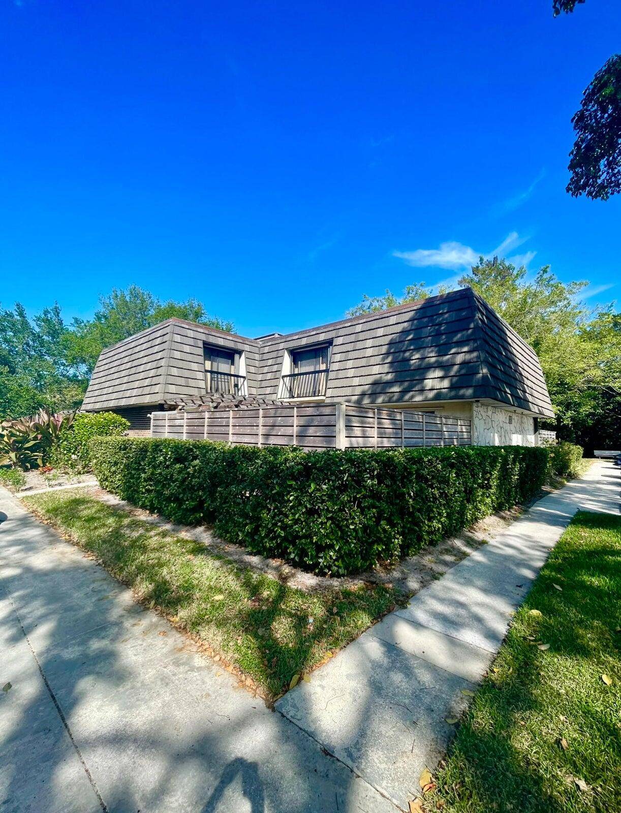 Welcome to 903 9th Terrace, a beautifully renovated lakeview residence in Palm Beach Gardens, FL.