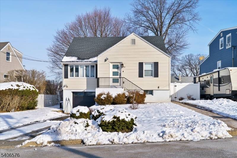 Welcome to this updated Cape Cod home in Woodland Park, NJ, blending classic charm with modern upgrades.