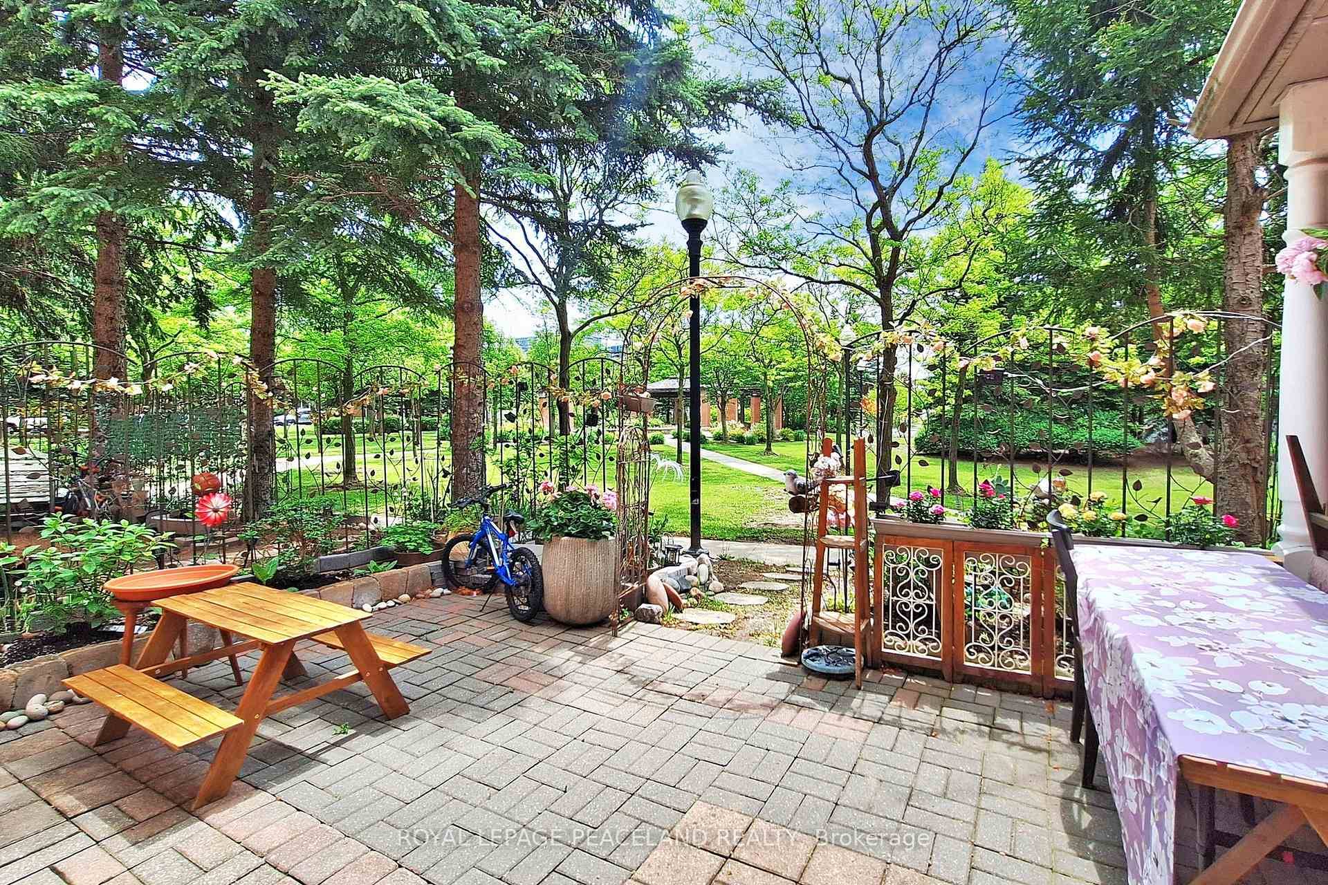 Rarely offering ! ! One of the best few units has front and back yard, and back into the park in this guarded community.