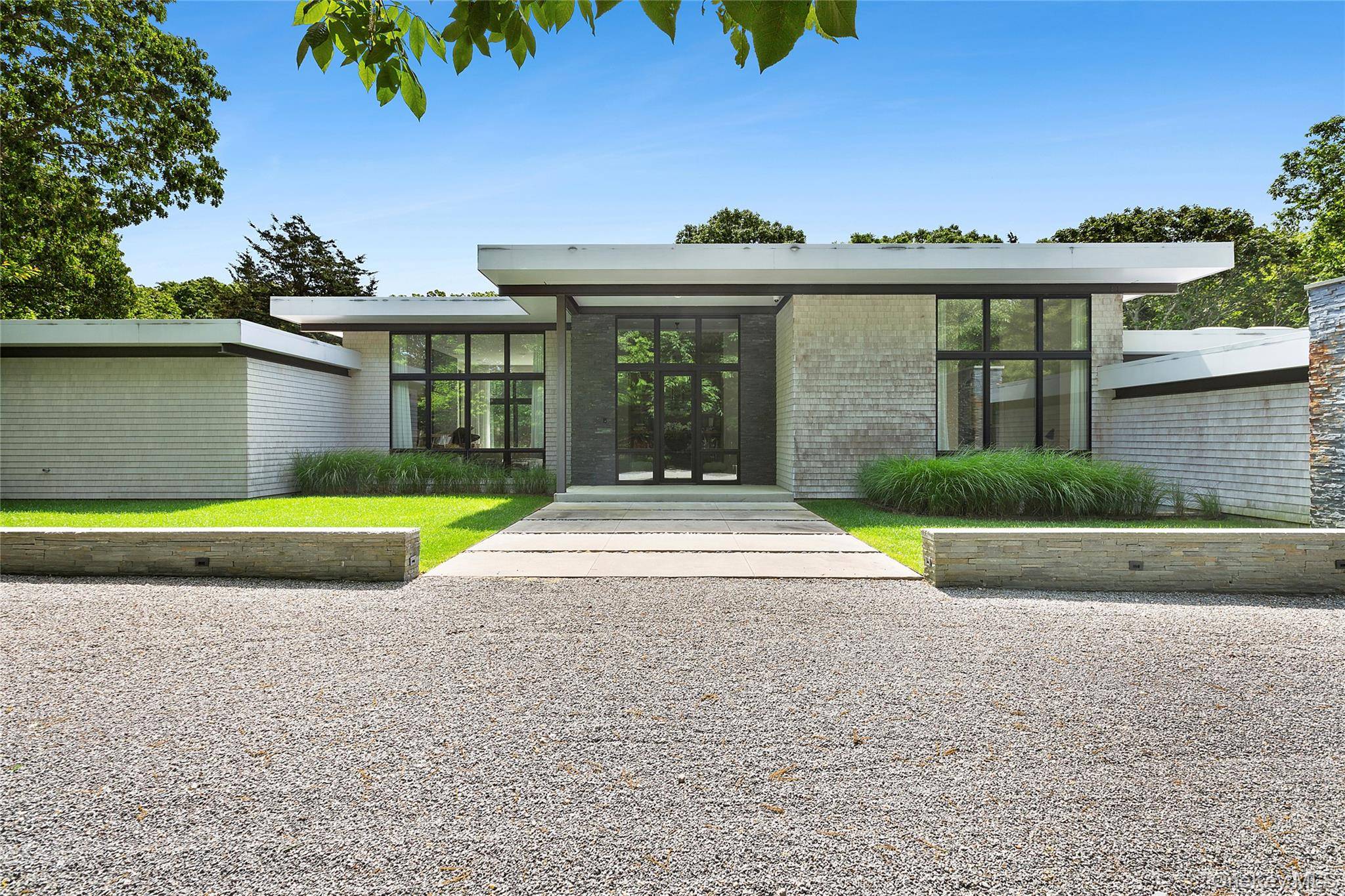 This custom build modern radiance inspired by the original home where renowned abstract expressionist critic Harold Rosenberg once resided leaves nothing to the imagination.