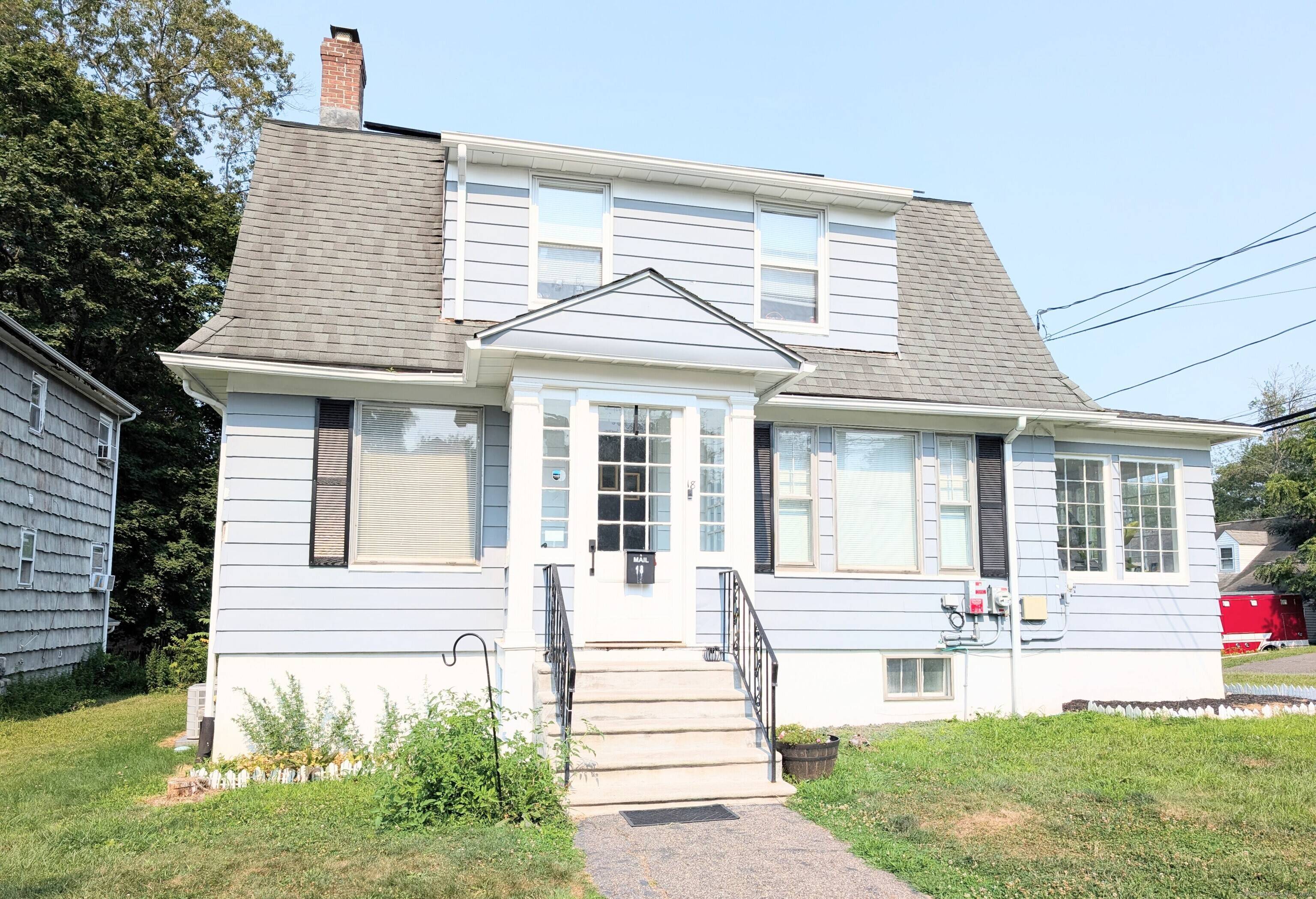 This beautifully updated 4 bedroom, 2 bath Dutch Colonial offers the perfect blend of charm, comfort, and modern convenience in Bridgeport's desirable North End.