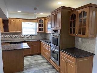 Look no further ! Come and see this beautiful 4 bedroom 2 bath corner SFH.