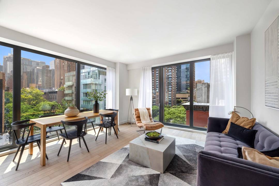 Step into this stunning corner unit two bedroom, two bathroom residence, where elegance meets functionality in the heart of Midtown West.