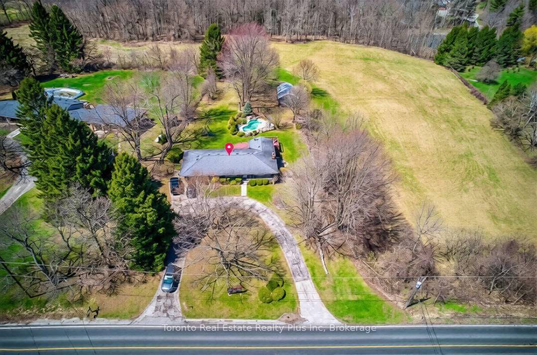 Welcome to this exceptional 10 acre estate located in the peaceful countryside of Burlington, offering the perfect blend of rural tranquility and convenient access to nearby urban amenities.