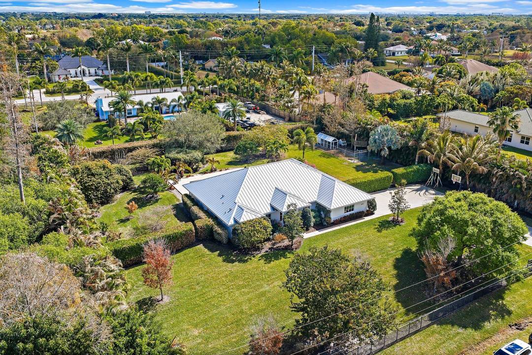 Beautifully updated 4 bedroom, 3 bathroom pool home situated on a well manicured 1 acre parcel.