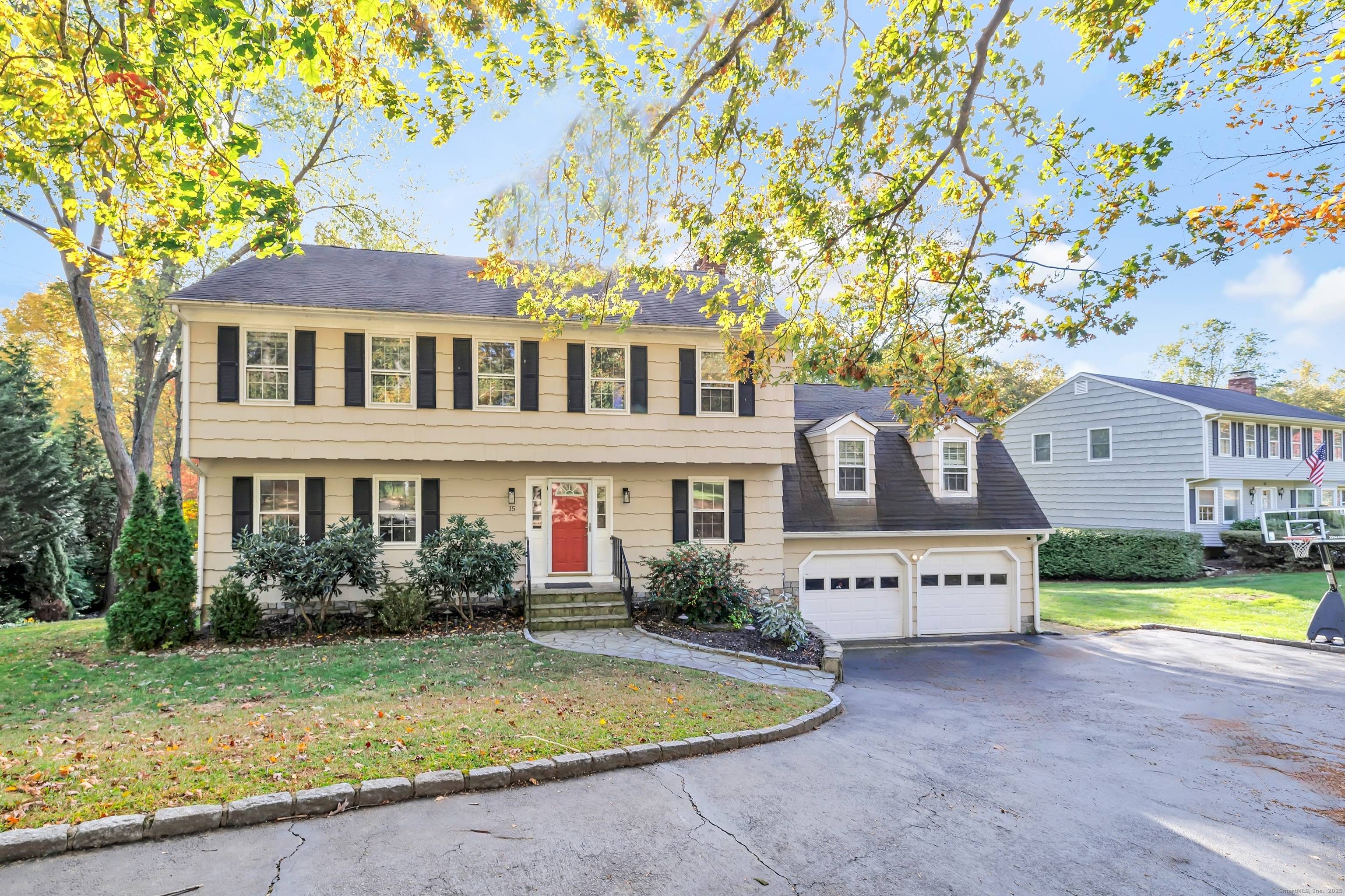 Welcome to 15 Blackberry Road, a beautiful Colonial set on a quiet cul de sac along the scenic Pequonnock River in Trumbull.