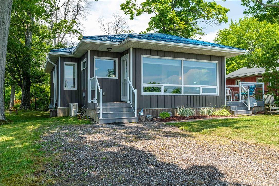 WATERFRONT DELIGHT ! Rare opportunity to own custom built, fully winterized open concept bungalow, complete with gas stove and electric baseboard heating, Heat pump AC and spray foam insulation with ...
