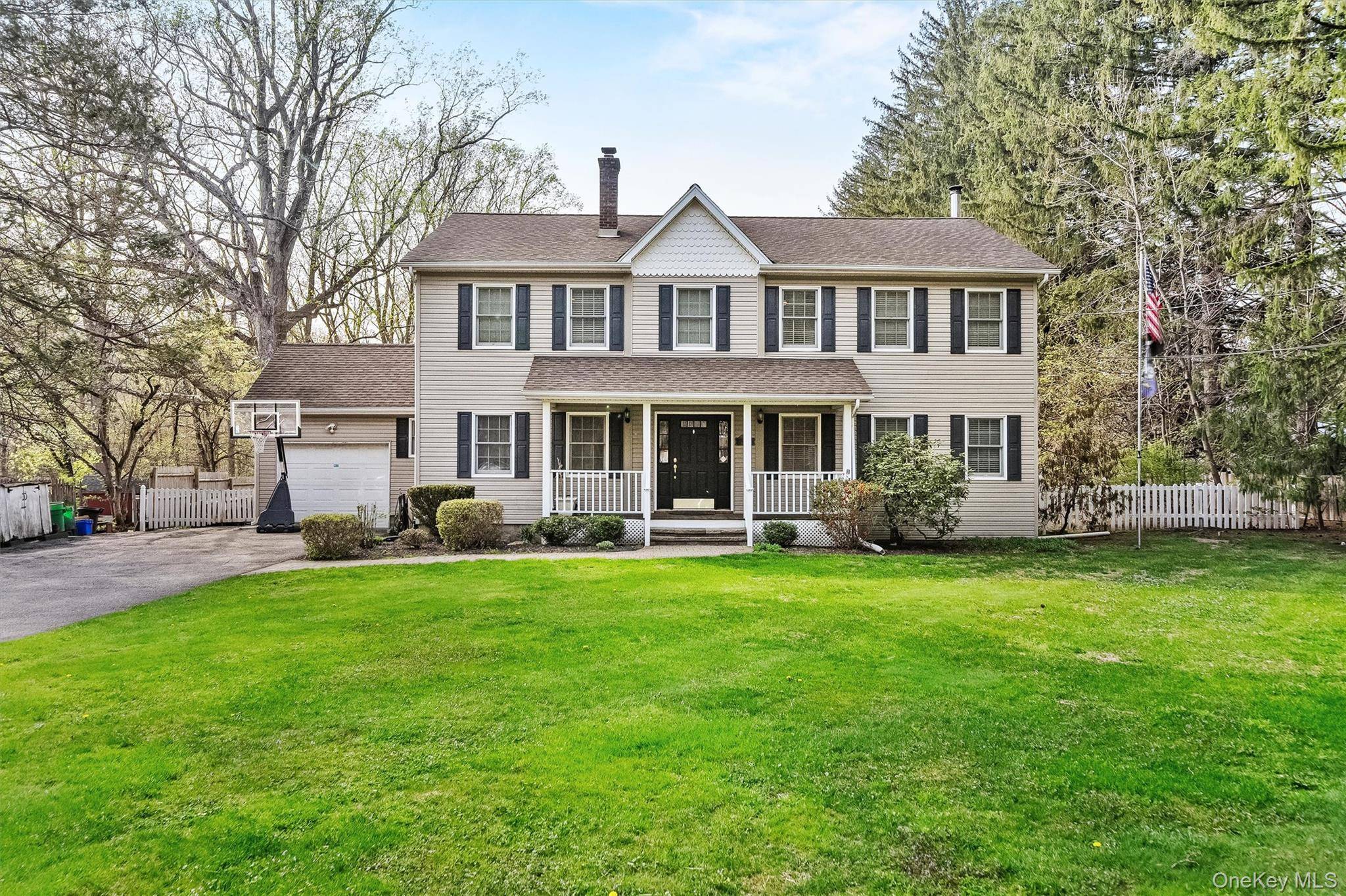 Exquisite Colonial on a Sprawling One Acre Lot in Montebello.
