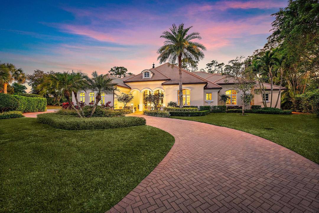 Tucked away within the prestigious, gated golf community of Old Marsh, this custom built estate is the epitome of luxury and privacy.