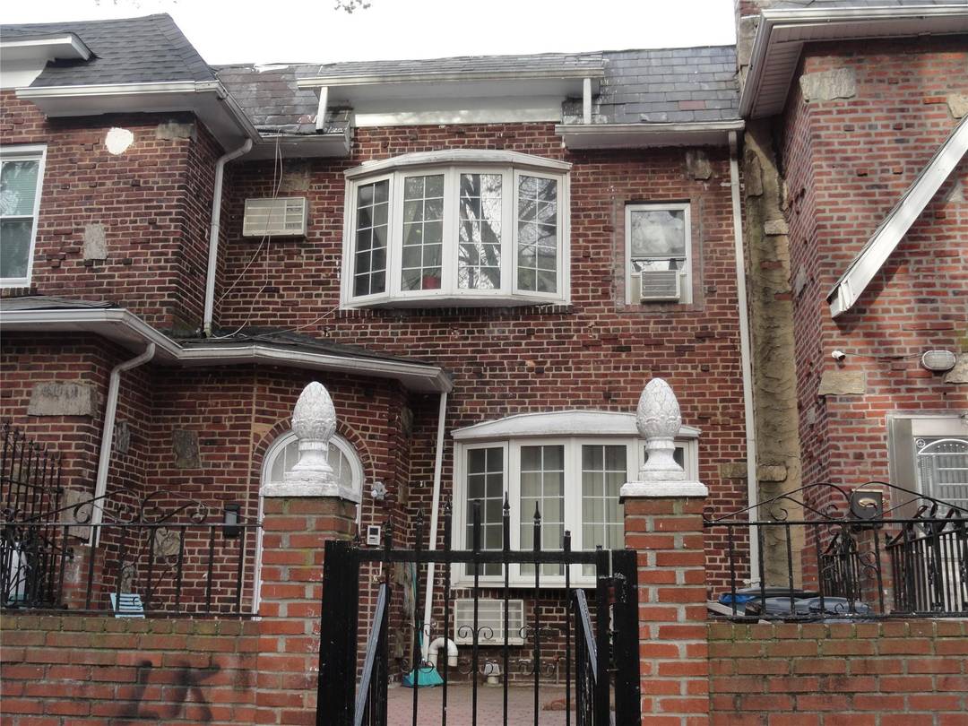 This solid brick legal two family home checks every box.