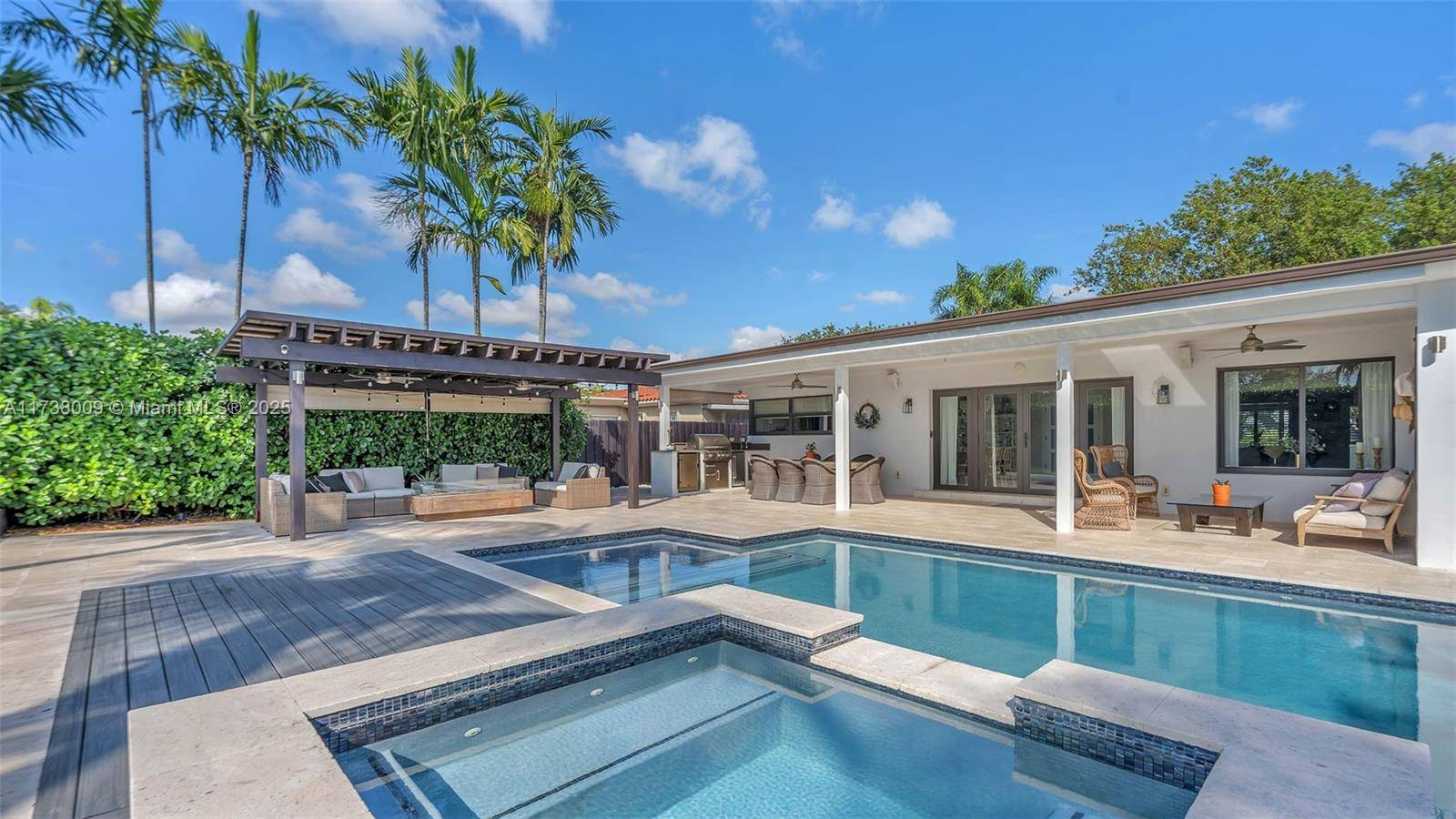 Nestled in South Miami, this beautifully remodeled home blends modern elegance with comfort.