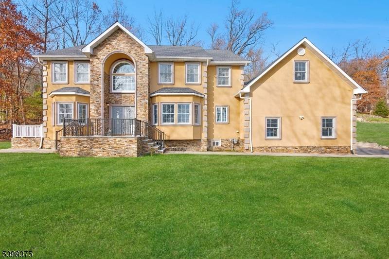 Nestled on nearly two acres in the heart of Green Brook neighborhood, this majestic Colonial exudes sophistication, character, and timeless style.