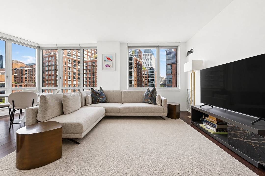 Step into this bright and airy corner home and be instantly captivated by expansive North and East facing floor to ceiling windows that flood the space with natural light and ...