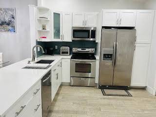 Escape to paradise in this beautifully updated 2 bedroom, 2 bathroom condo located in the sought after Huntington Pointe, a premier 55 gated community in the heart of Delray Beach.