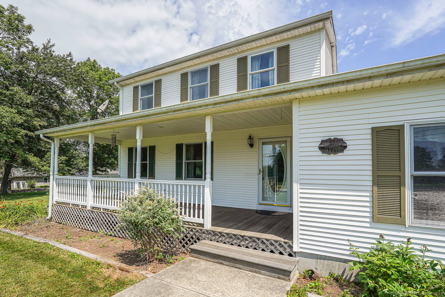 Charming 3 Bedroom Home with Dream Garage on 1.