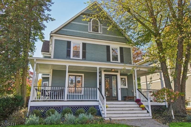 Blending historic charm with modern sophistication, this exceptional three story Victorian sits just steps from Downtown Westfield.