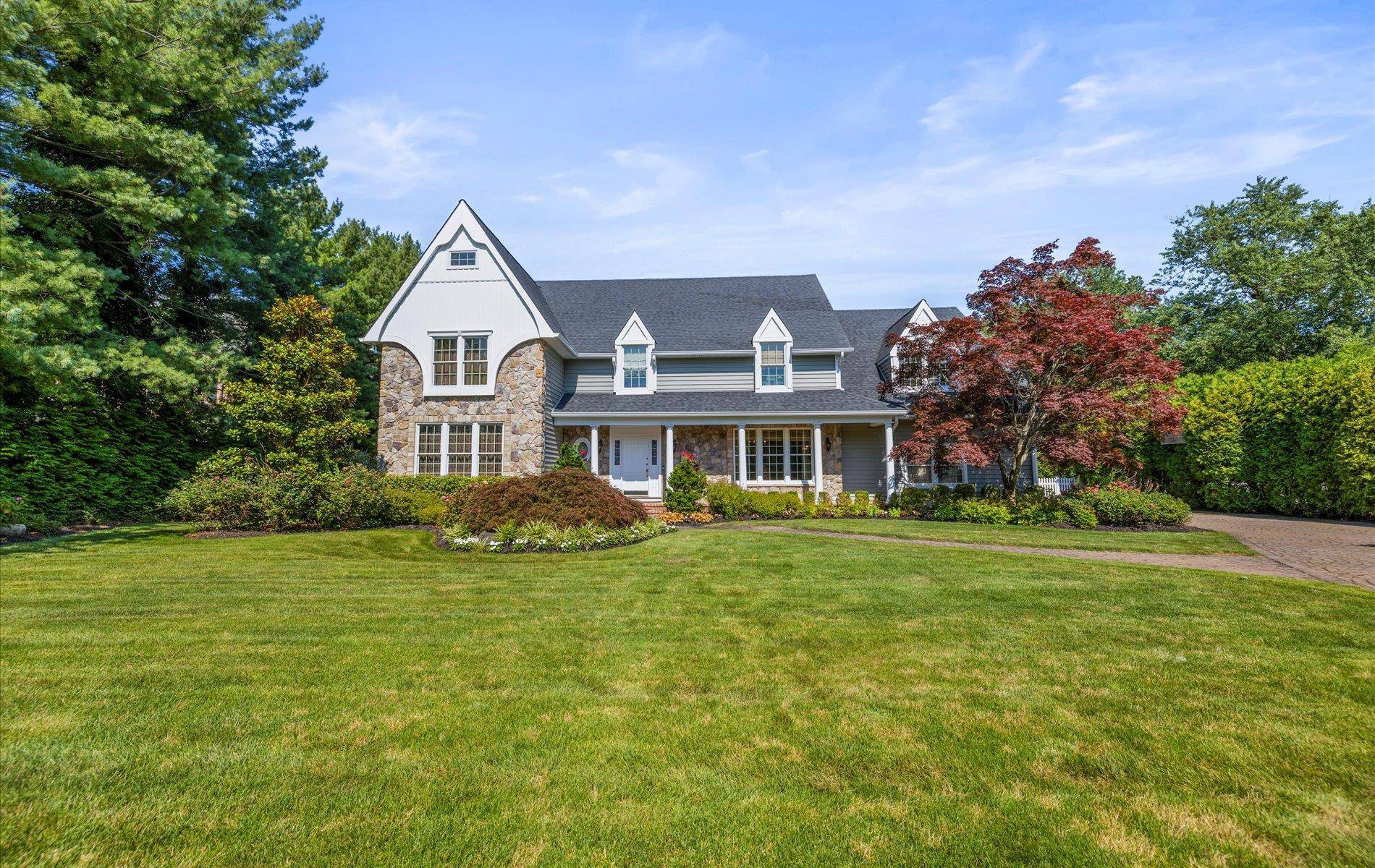 Located in a quiet cul de sac on one of the most beautiful streets within the Half Hollow Hills School District, this exceptional residence offers the perfect blend of elegance, ...