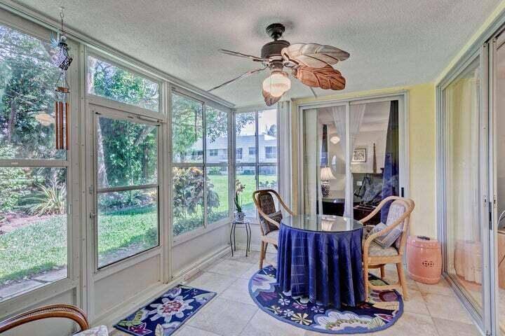THIS 1ST FLOOR UNIT WITH OPEN KITCHEN AND TILE FLOORS READY TO MOVE IN.